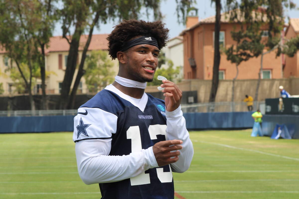 Dallas Cowboys defensive back Caleb Downs walks off the field after his first training camp practice with the team at the River Ridge Playing Fields in Oxnard, Calif. on July 29, 2026.
